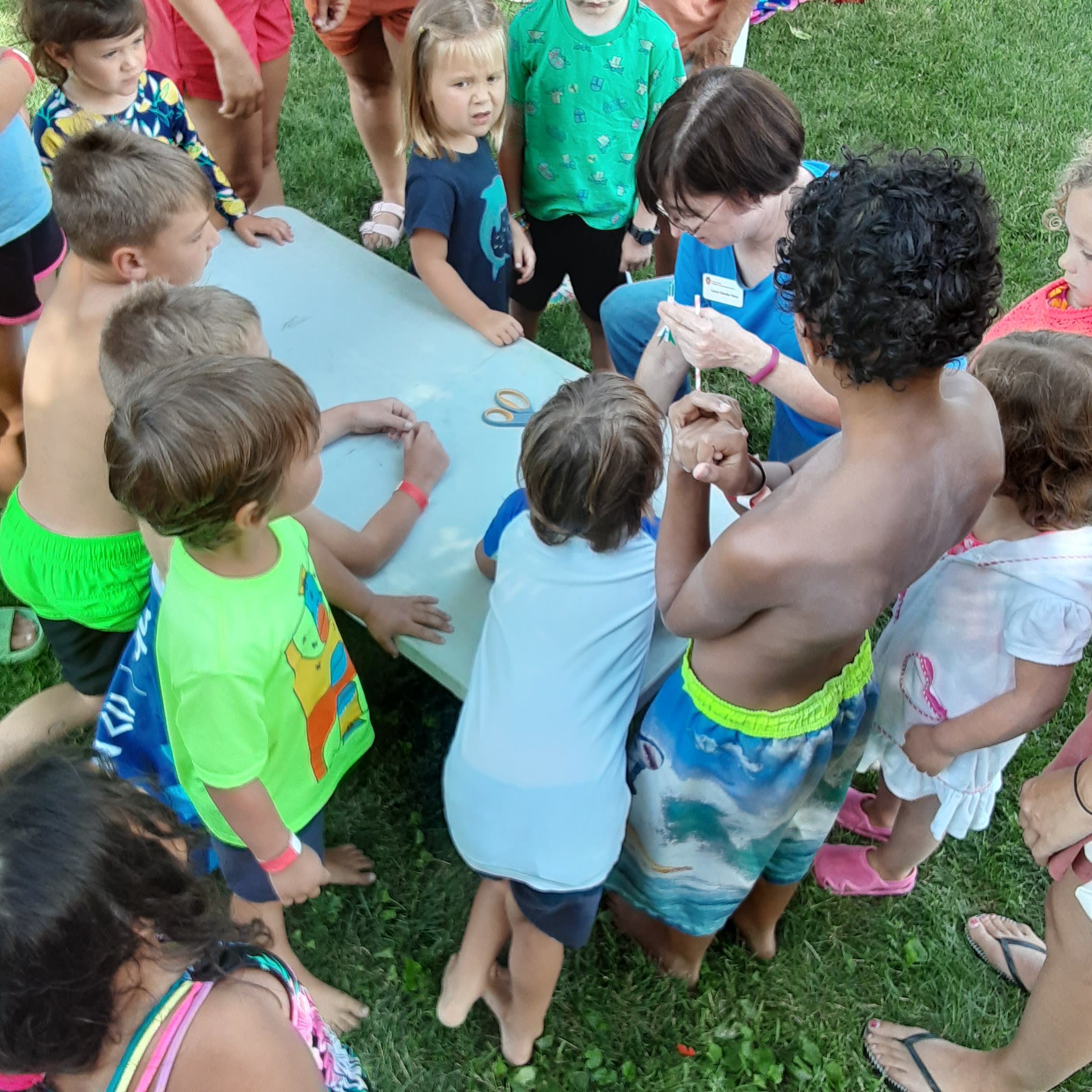 Youth creating STEM rockets during a storytime.