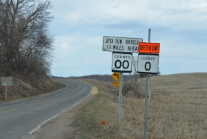 Two county road signs with bridge weights listed on a rural Wisconsin road