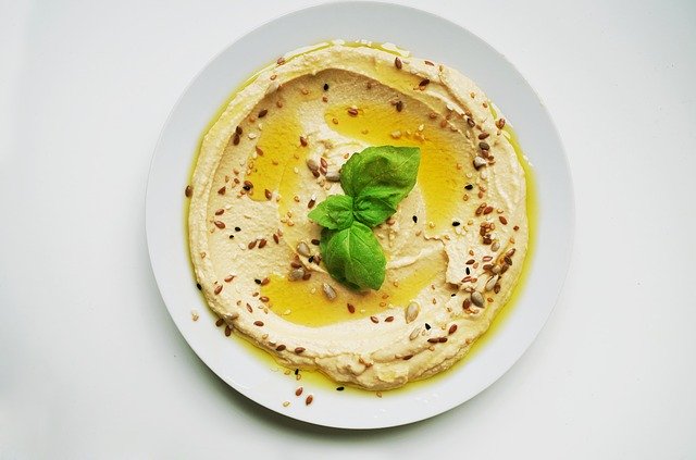 A weed killer that’s been linked to cancer was found in six types of hummus. Here’s what you need to know.