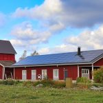 farm building with solar panels