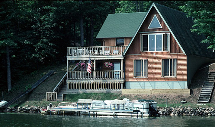 house next to water's edge