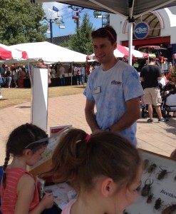 PJ Liesch talks with Wisconsin State Fair-goers about bugs in Wisconsin. Visit the Insect Experts booth at Wisconsin Farm Technology Days to identify Wisconsin bugs.