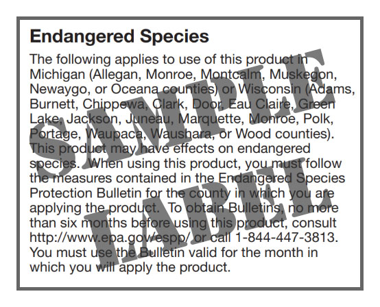 Endangered Species warning listing specific Michigan and Wisconsin counties with pesticide use restrictions and bulletin requirements.